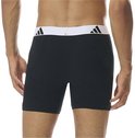 Zwarte boxershorts met brede, witte Adidas-band met logo's.