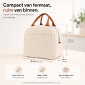 Beige koeltas van textiel met bruine handvatten. Afmetingen: 25,5x18x21 cm.