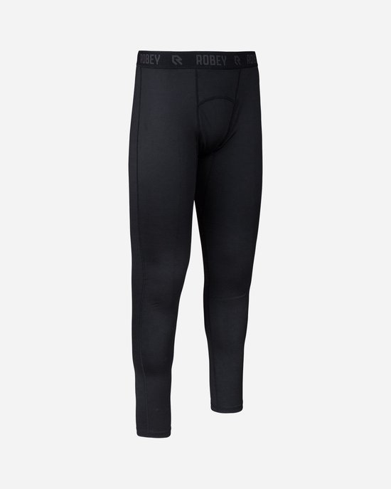 Legging long thermique noir pour homme, debout.