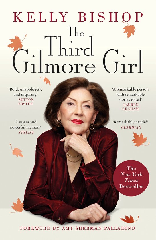 Couverture du livre 'The Third Gilmore Girl' avec un portrait de Kelly Bishop en veste en velours rouge. Texte : 'The Third Gilmore Girl', 'New York Times Bestseller'.