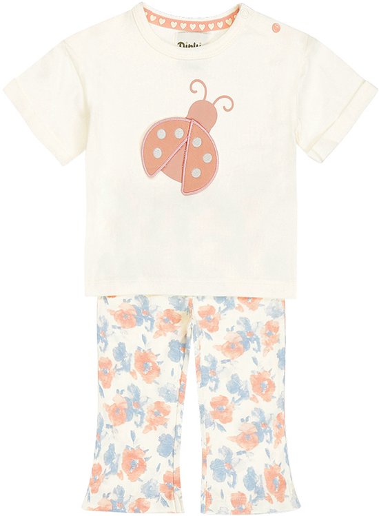 Crème pyjamaset met een T-shirt met lieveheersbeestje en een broek met bloemenprint.