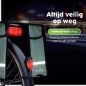 Mintgroene dubbele fietstas met reflecterende strips, verhoogt zichtbaarheid in het verkeer.