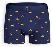 Donkerblauwe boxershorts met gele croissantprint.