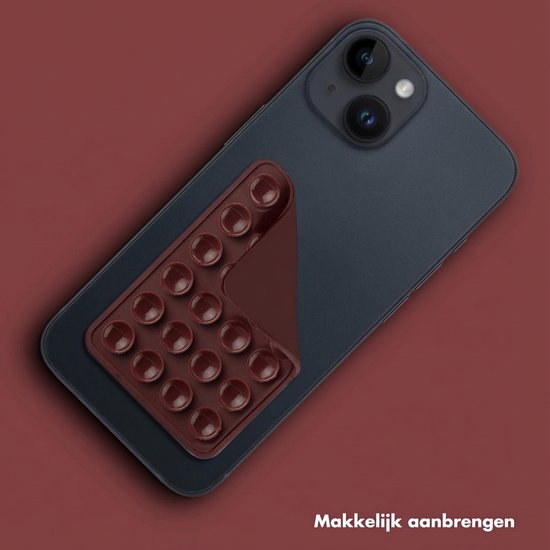 Bruine zuignap pad met 12 rondjes op de achterkant van een donkerblauwe iPhone. "Makkelijk aanbrengen".