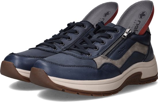 Paar blauwe leren sneakers met ritssluiting en Rieker binnenzolen.