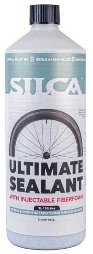 Witte fles Silca Ultimate Sealant met een afbeelding van een fietswiel en tekst "ULTIMATE SEALANT" en "WITH INJECTABLE FIBERFOAM".
