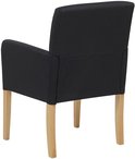 Chaise de salle à manger noire avec revêtement en tissu et pieds en bois, vue arrière.