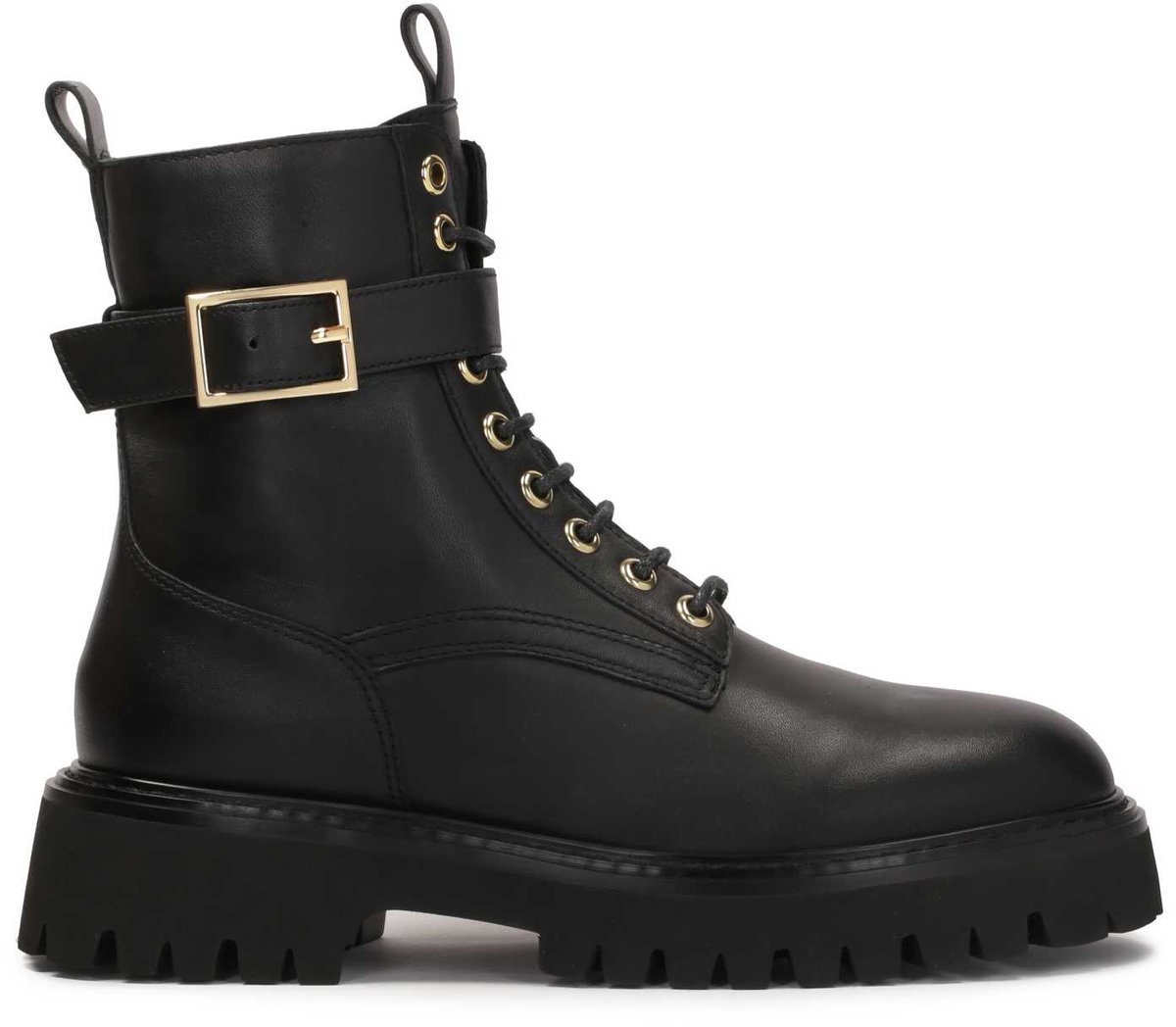 Black boots on a treaded sole