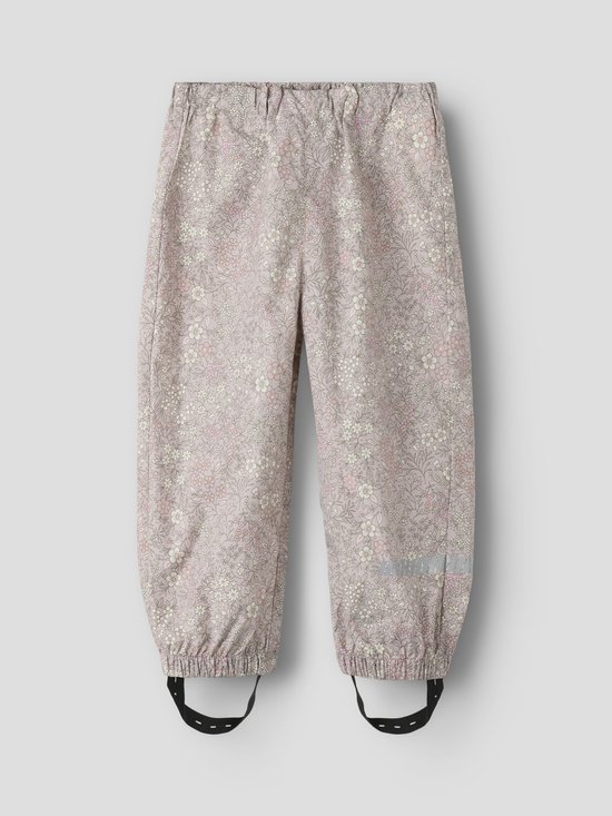 Roze regenbroek met all-over bloemenprint in wit en lichtroze.