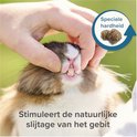 Een hand houdt de bek van een konijn open om de tanden te tonen. Een cirkel toont brokjes en 'Speciale hardheid'.