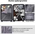 Zwarte koffer met ruime opbergruimte, pakbanden en vakken.