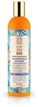 Gele fles met een label met blauwe, oranje en witte patronen. Bevat de tekst 'NUTRITION ET REPARATION, CHEVEUX FRAGILISES ET ABIMES'.