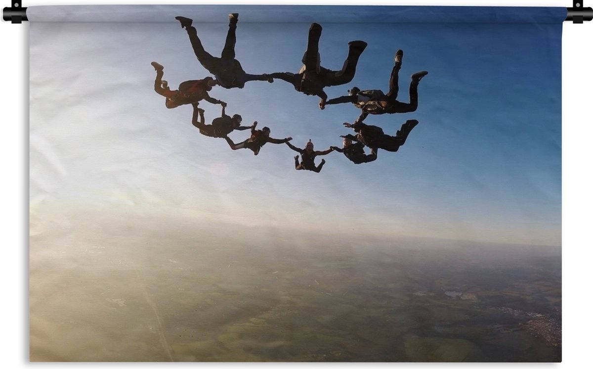 Wandkleed Sky Dive - Skydiven in zonsondergang Wandkleed katoen 120x80 cm - Wandtapijt met foto - 1001Tapestries