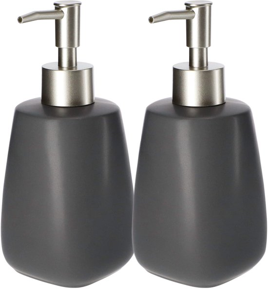 Twee donkergrijze keramische zeepdispensers met zilverkleurige pompjes.