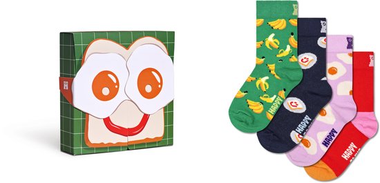 Groene, navy, roze en rode sokken met bananen, gebakken eieren en 'HAPPY' print. Naast een geschenkverpakking met gezicht.