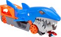 Blauwe Hot Wheels haaienauto transporteur met oranje opslag. Gele auto wordt opgeslokt.