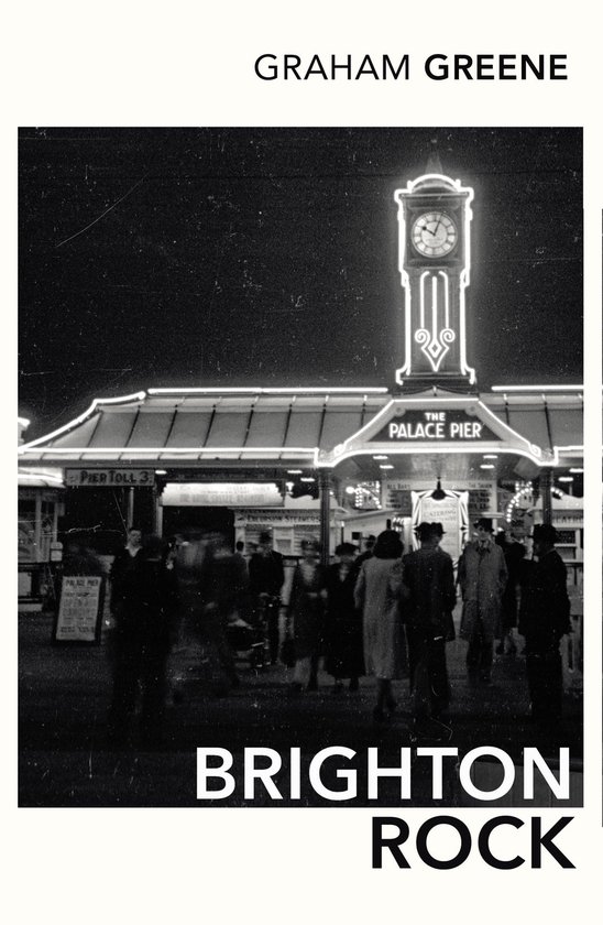 Couverture du livre "Brighton Rock" de Graham Greene, montrant la jetée Palace Pier la nuit.