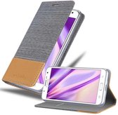 Cadorabo Hoesje geschikt voor Samsung Galaxy J7 2015 in LICHTGRIJS BRUIN - Beschermhoes met magnetische sluiting, standfunctie en kaartvakje Book Case Cover Etui