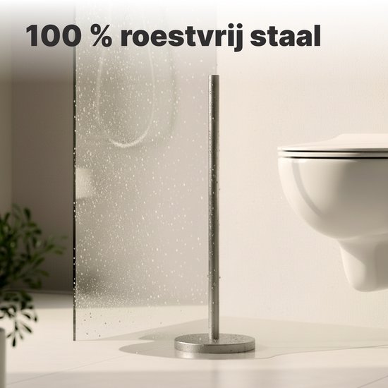 Roestvrijstalen toiletrolhouder in een badkamer met lichte vlekken.