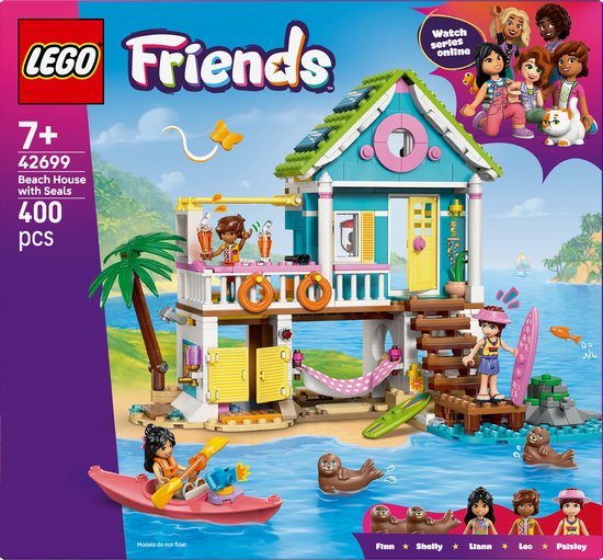 LEGO Friends strandhuis met zeehonden speelset. Blauw huis met roze accenten en groen dak. Met kajak, zeehonden en een palmboom.