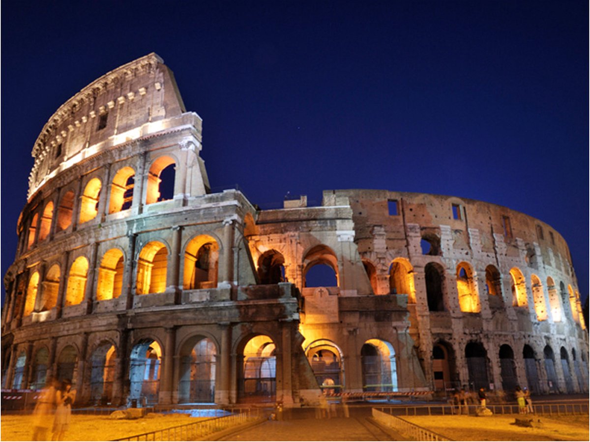 Fotobehang - Colloseum nachts.