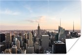 Skyline van New York tijdens een zonsondergang Poster 60x40 cm - Foto print op Poster (wanddecoratie woonkamer / slaapkamer)