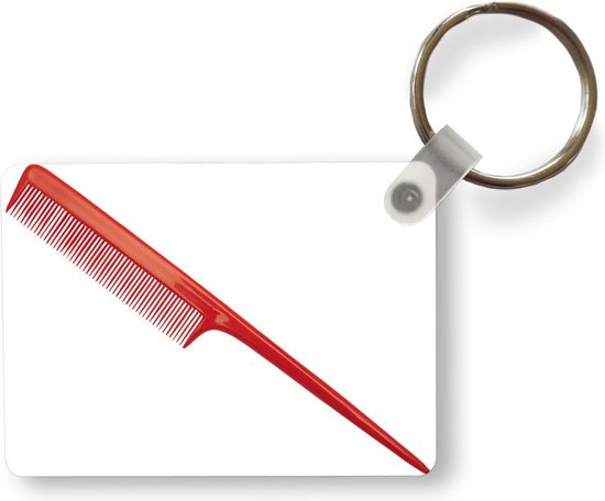 Peigne porte-clés - Un peigne à cheveux roux sur fond blanc. Porte-clés en  plastique -... | bol.com