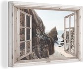Canvas - Doorkijk - Strand - Zee - Rotsen - Woonkamer - 140x90 cm - Canvas schilderij - Canvas doek
