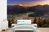 Behang - Fotobehang Zonsondergang bij Zwitserse stad Interlaken - Breedte 360 cm x hoogte 240 cm