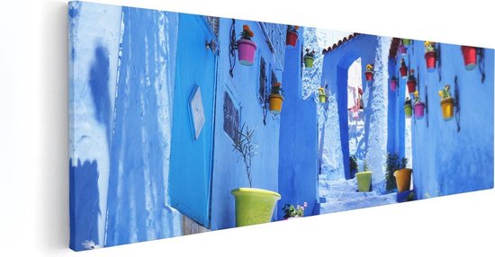 Artaza Canvas Schilderij Blauwe Huizen met Bloempotten in Chefchaouen, Marokko - 60x20 - Foto Op Canvas - Canvas Print
