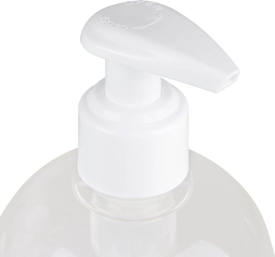 Close-up van de witte pompdispenser op een transparante fles