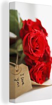 Canvas Schilderij Rode rozen op een witte achtergrond voor valentijn - 20x40 cm - Wanddecoratie