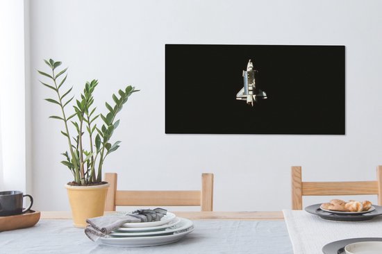 Tableau sur toile Une vue satellite d'une navette spatiale - 80x40 cm - Décoration murale