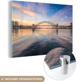 MuchoWow® Glasschilderij 120x80 cm - Schilderij acrylglas - Sydney Harbour Bridge in de avond in Australië - Foto op glas - Schilderijen