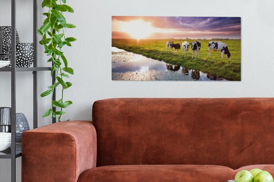 Tableau sur toile Vaches pendant un coucher de soleil - 80x40 cm - Décoration murale Art