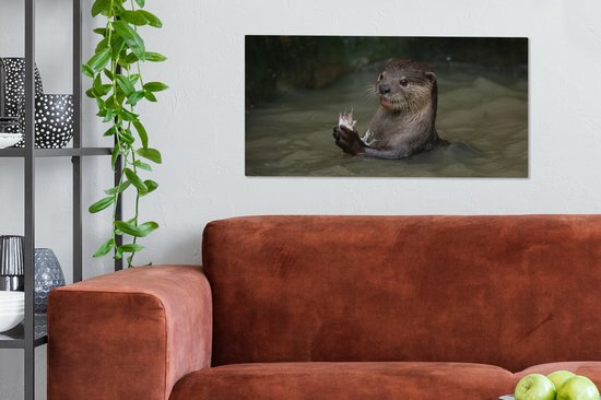 Tableau sur toile Loutre avec de la nourriture dans l'eau - 80x40 cm - Décoration murale
