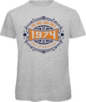 1974 The One And Only | Feest Kado T-Shirt Heren - Dames | Donker Blauw - Goud | Perfect Verjaardag Cadeau Shirt | Grappige Spreuken - Zinnen - Teksten | Maat L