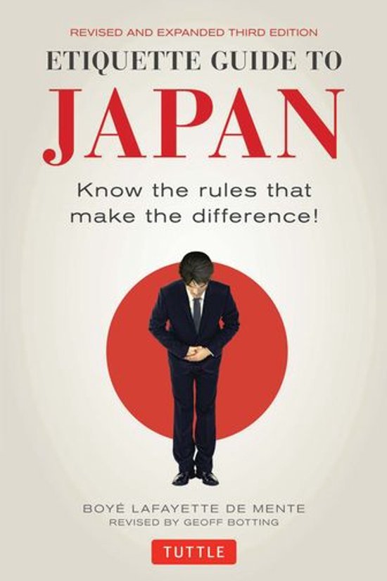 Boek "Etiquette Guide to Japan", derde editie, met een man in pak die buigt voor een rode cirkel.