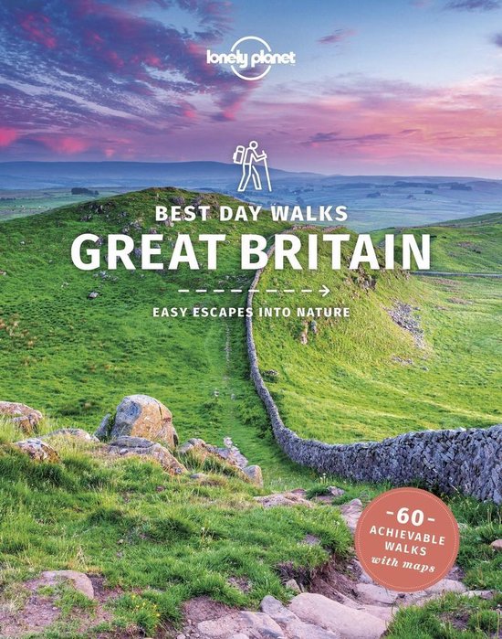 Boek "Lonely Planet: Beste dagwandelingen Groot-Brittannië" met de tekst "Easy Escapes into Nature" en "60 haalbare wandelingen met kaarten". Landschap met glooiende groene heuvels en stenen muur.
