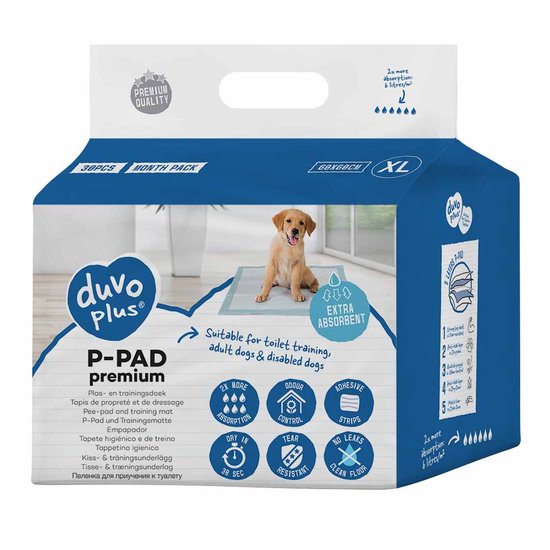Doos met Duvo+ P-PAD premium XL plasmatten. Een gele puppy staat op een plasmat.