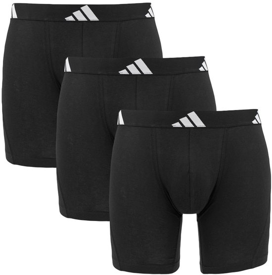 Drie zwarte Adidas boxer briefs met witte Adidas logo's op de tailleband.