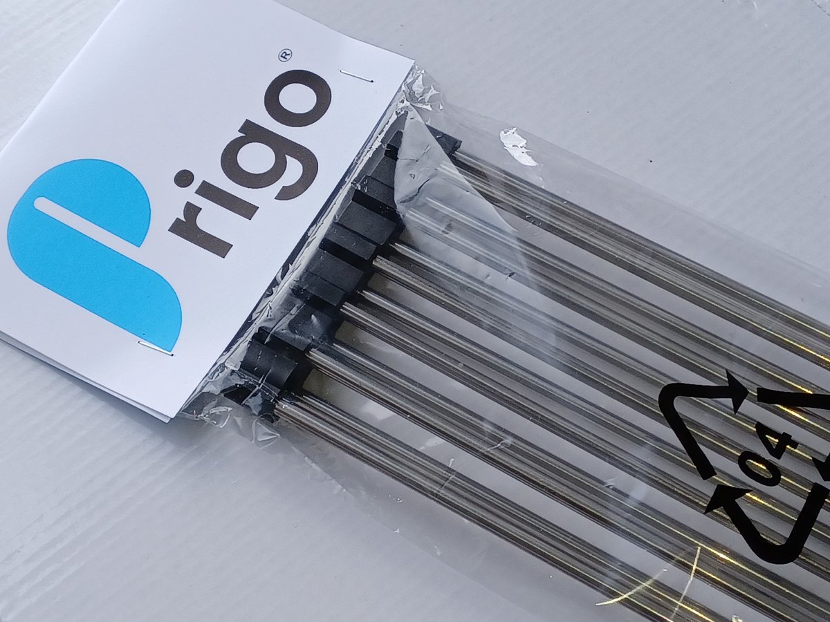 Goedkoopste Prigo SET VAN 2 - pannenonderzetters - rooster/afdruiprek - zwart/zilver - 23 cm x 37 cm- antislip - oprolbaar