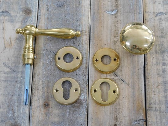 Wegrijden wervelkolom tentoonstelling Set: 1 deurknop, 1 jack en 4 rozetten, deur-fittingen, messing gepolijst  glanzend | bol.com