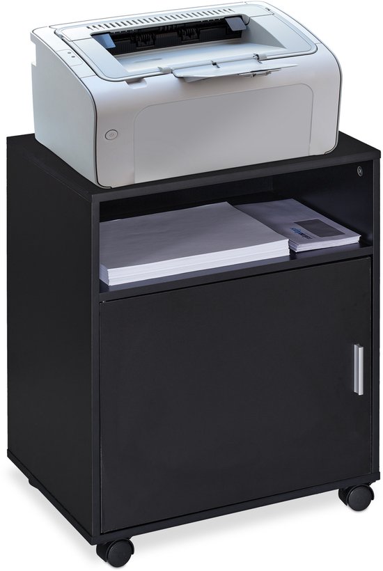 Zwarte kast met een printer erop, papier en tijdschriften in het open vak.