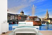 Behang - Fotobehang Kleurrijke lucht boven het Trafalgar Square in Engeland - Breedte 390 cm x hoogte 260 cm