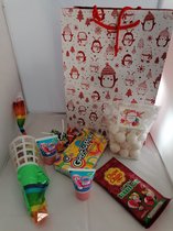 Mooie geschenkstas gevuld met snoep.