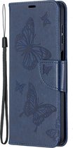 Mobigear Telefoonhoesje geschikt voor Samsung Galaxy A12 Hoesje | Mobigear Butterfly Bookcase Portemonnee | Pasjeshouder voor 2 Pasjes | Telefoonhoesje voor Pinpas / OV Kaart / Rijbewijs - Blauw