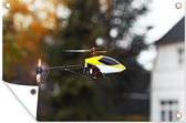 Tuinposter - Tuindoek - Tuinposters buiten - Vliegende model helikopter - 120x80 cm - Tuin