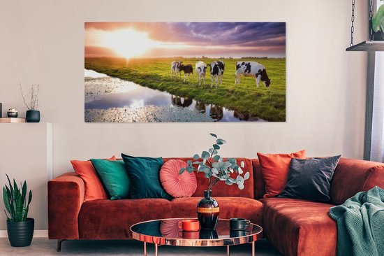 Tableau sur toile Vaches pendant un coucher de soleil - 160x80 cm - Décoration murale Art