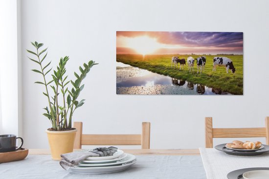 Tableau sur toile Vaches pendant un coucher de soleil - 80x40 cm - Décoration murale Art